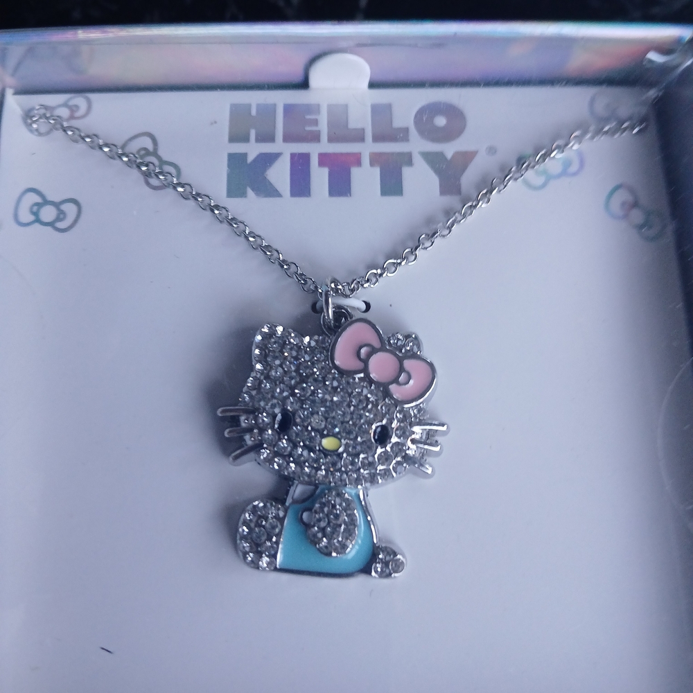 Hello Kitty Silver Pendant with Pink Bow and Blue Dress